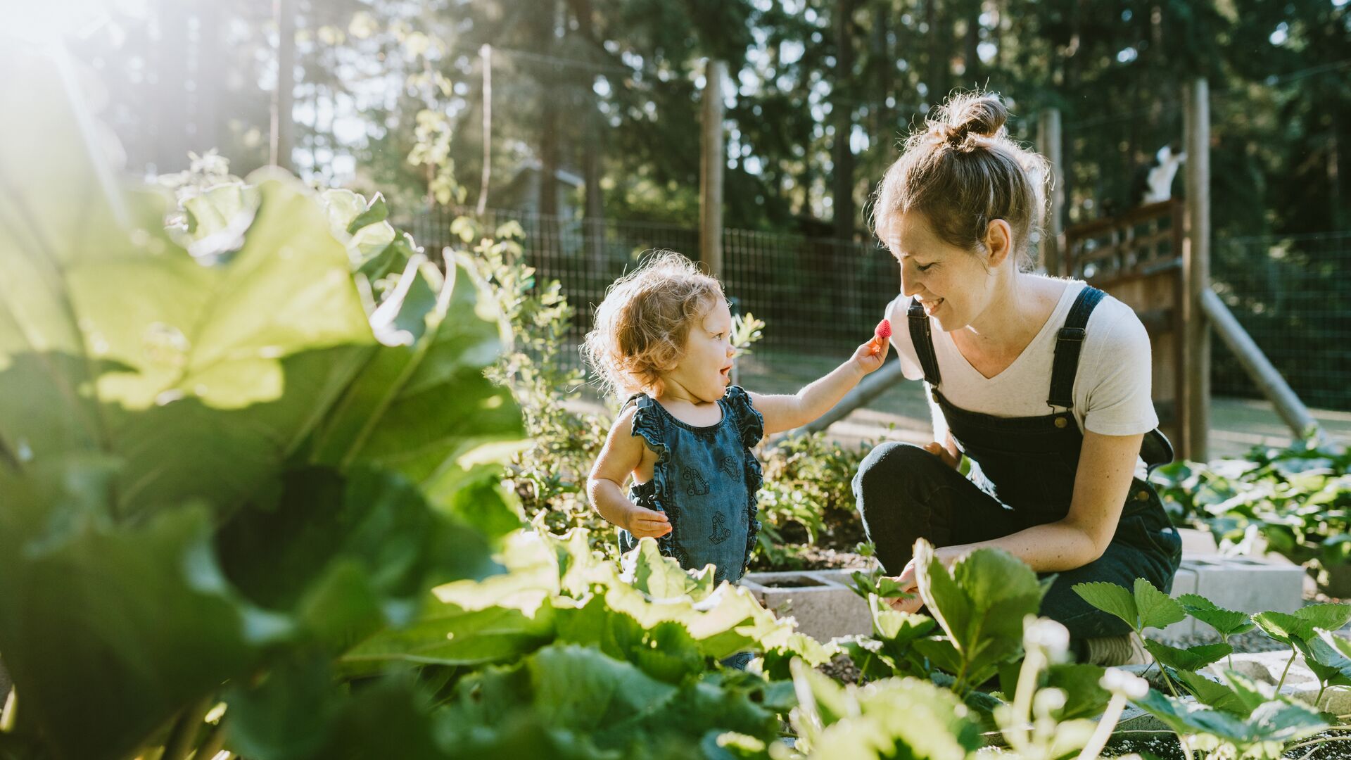 Woman and child gardening